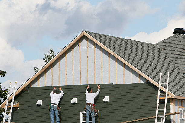 Professional Emergency Siding Repair technician working in Dover, MA
